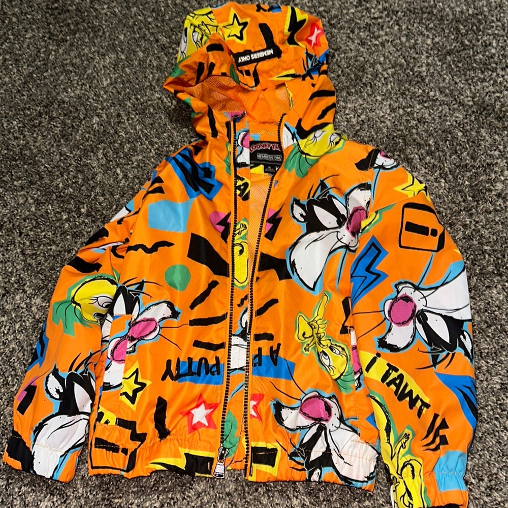 Child Members Only wind breaker with hood.